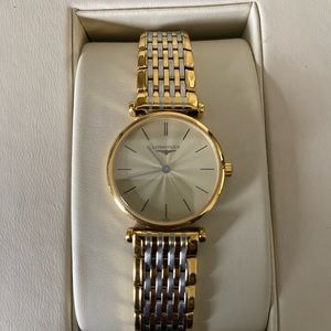 Longines woman’s gold and silver watch